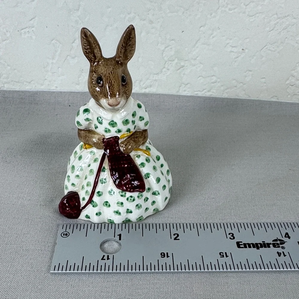 Brown Bunny Figurine in White Dress with Green Polka Dots and Maroon Accessory‎